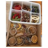 Flat of costume jewelry