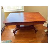 Wood coffee table. Could use refinished