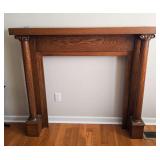 Wood fireplace mantel