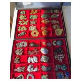 2 trays of costume jewelry. Trays are included