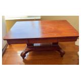 Wood coffee table. Could use refinished