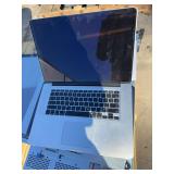 MacBook Pro. Did not have charger at time of cataloging.