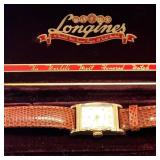 Yellow gold filled Longines tank style watch.