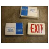2 LIGHTED EXIT SIGNS