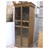 GLASS FRONT OAK CABINET 29X23X81