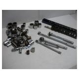ASSORTED 1/2 IN DRIVE SOCKETS RATCHETS AND EXT