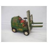 VINTAGE TRADE MARK JAPANESE FORKLIFT TIN TOY