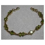 STERLING SILVER BRACELET W/ GREEN GEMSTONES