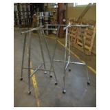 (2) METAL GARMENT DISPLAY RACKS ON WHEELS