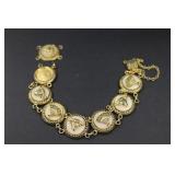 Gold Tone Bracelet w/Fan & Bull Motifs