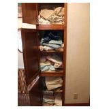 Assorted Bedding in Cupboards