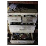 Contents of White Cabinet Under Work Bench