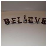 SMALL NATIVITY, SPELLS OUT BELIEVE