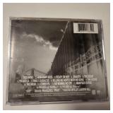 FUGEES MUSCI CD, THE  SCORE, UNOPENED