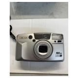 PENTAX IQ ZOOM 135MM CAMERA,  POWERS ON