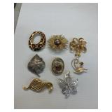 8 BROOCH PINS