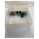 12 Marbles in a tupperware box