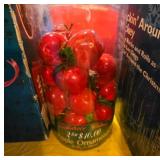 Container of Artificial Apple Ornaments