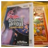 Two Nintendo Wii Games Guitar Hero and Punch out