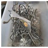 Metal Display Peg Hooks in Storage Bin