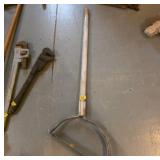 Scythe blade with wooden handle