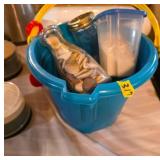 Buckets with shells, sand + mason jars
