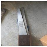Numerous Saw Blades with Wooden Holder
