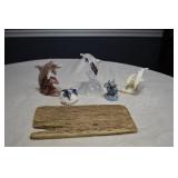 Dolphin Statues and Candle