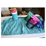 Duffle bag, Igloo Cooler, and H20 waterproof Garme