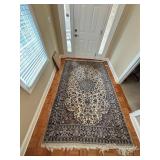 Handwoven Persian Wool Rug with Floral Pattern