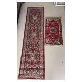 Two Red Rugs with Rug Pads