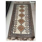 Handwoven Wool Rug With Geometric Patterns