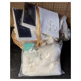 Basket of Bedding and Window Treatments