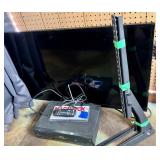 Samsung HDTV, Toshiba VCR, and Mount