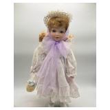 Porcelain Doll in Floral Dress with Hat