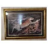 Framed Print of Leopard Climbing