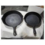 Two Cast Iron Skillets
