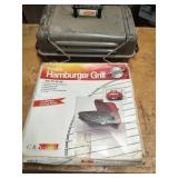 One New and One Used Portable Grills