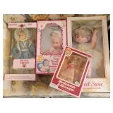 Four Dolls in Packaging Four Dolls in Packaging