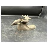 Metal Sculpture of Dolphins with Rotating Feature