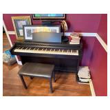 Kawai Piano with Bench, Sheet Music, and Artwork