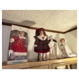 Four Porcelain Collector Dolls