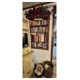 Bookshelf With Various Books and Decor