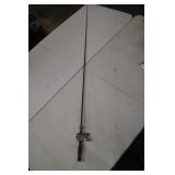 Vtg Fiberglass Rod w/ Mechanical Thumber Reel