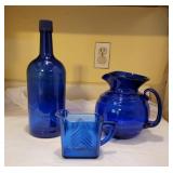 Three Blue Glass Items