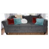 Gray Upholstered Sofa with Pillows