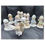 9 Precious Moments Figurines