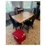 Wood Dining Table With Four Black Chairs