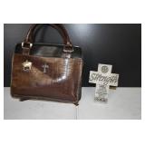 Holy Bible and Cross Statue