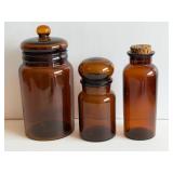 Three Amber Glass Jars